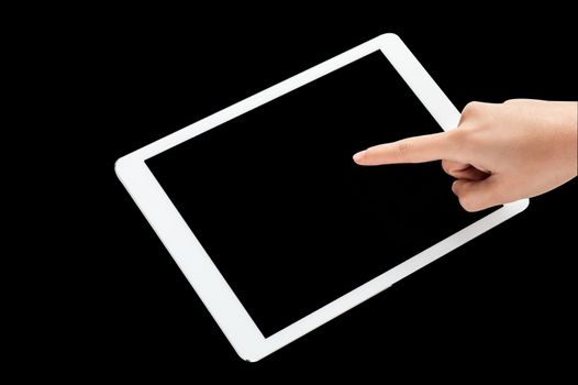 Woman finger pointing on tablet screen