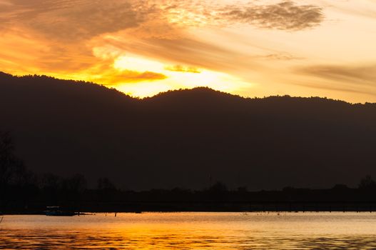 Sunrise in the morning. At the edge of the reservoir.