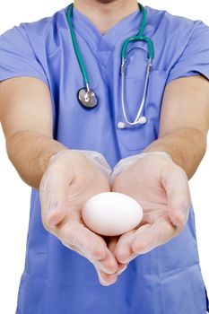 Egg in his hand the doctor - an allegory of life.