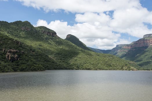 the swadini dam near the blyde river with the dragensberg as background