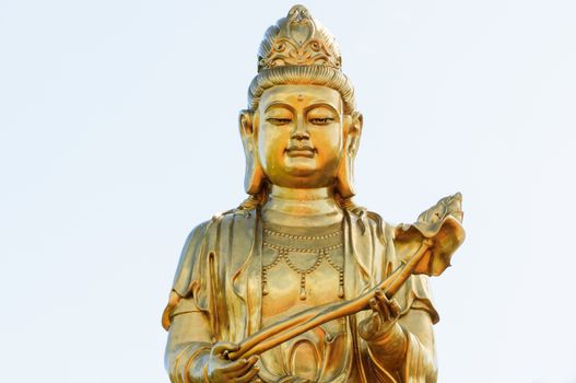 Statue of Guan Yin on white background