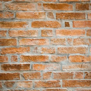 Old brick wall The walls of the building of the house. It consists of several cubes stacked formation.