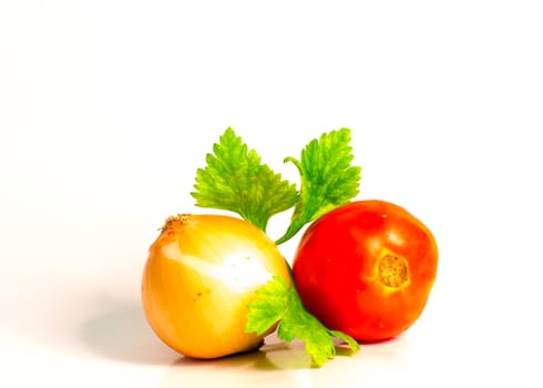 Collection of vegetables Celery, Onions and tomato A white background