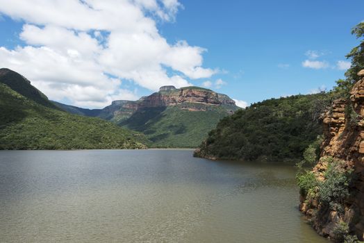 the swadini dam near the blyde river with the dragensberg as background