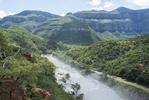 the swadini dam and blyde river the dragensberg as background