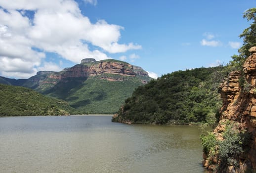 the swadini dam near the blyde river with the dragensberg as background