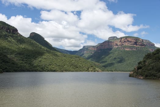the swadini dam near the blyde river with the dragensberg as background