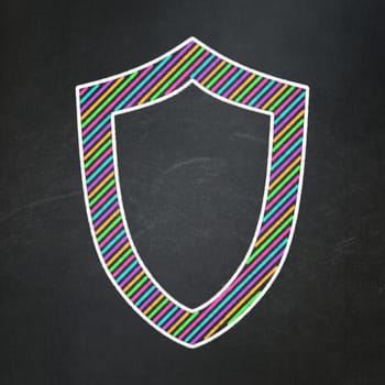 Safety concept: Contoured Shield icon on Black chalkboard background, 3d render