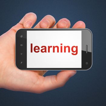 Education concept: hand holding smartphone with word Learning on display. Mobile smart phone on Blue background, 3d render