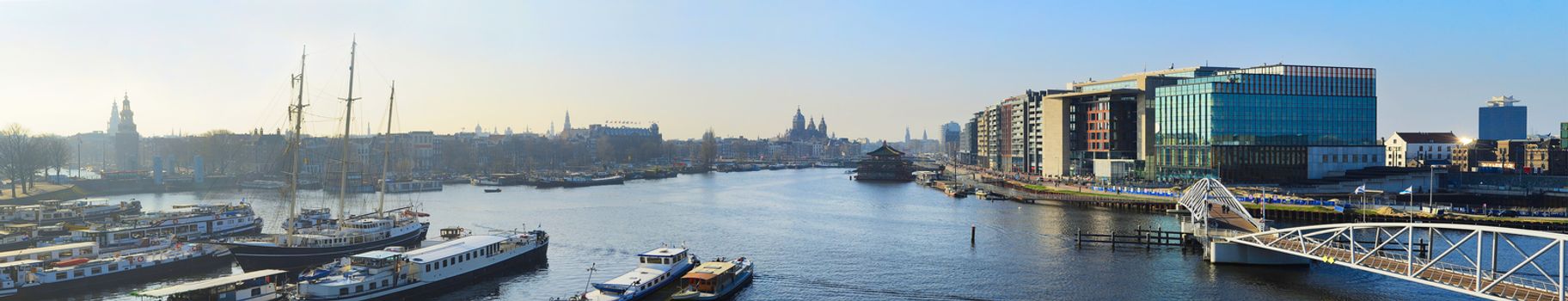 Aerial panorama of Amsterdam old town at sunset