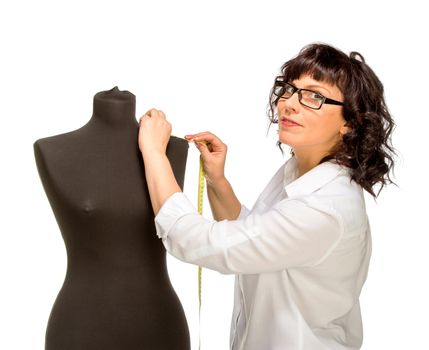 Adult tailor with mannequin, isolated on white