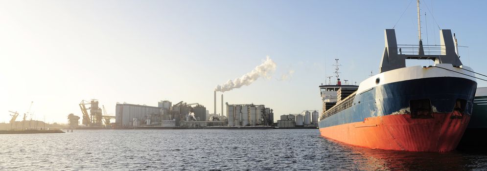 Panoramic view of tanker and power plant  in Amsterdam harbor . Netherlands