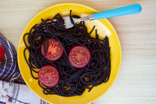 black pasta  with tomatoes sauce and shrimp