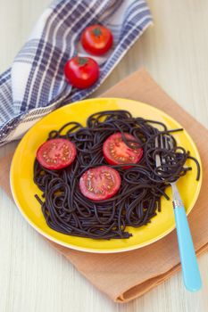 black pasta  with tomatoes sauce and shrimp