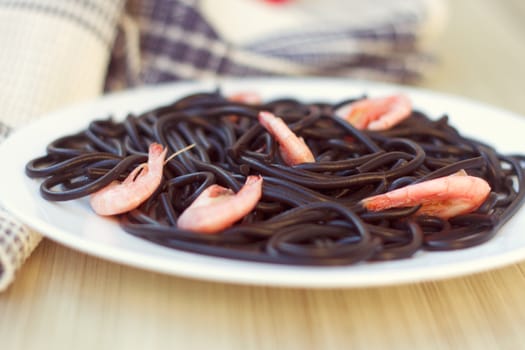 Black tagliatelle (pasta made with cuttlefish ink) with shrimp