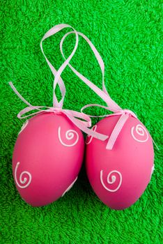 Easter decoration. Background with eggs on Turkish towel with space for text.
