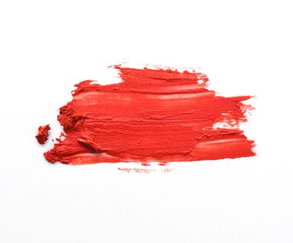 red lipstick stroke on white background