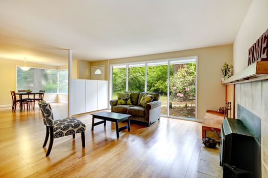 Living room with walkout deck. View of dining area