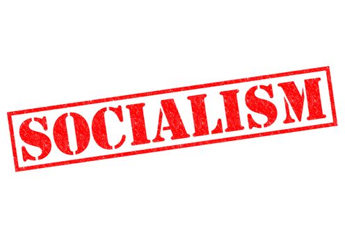 SOCIALISM red Rubber Stamp over a white background.
