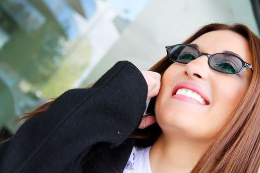 A business woman talking on the cell phone.