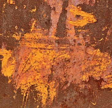 yellow smudge repainted rusty old steel plate