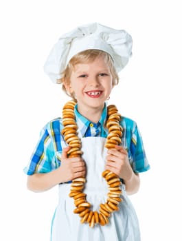 Little Cook Boy With A Bagels. Isolated on white background.