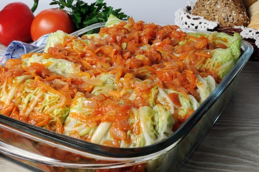 stuffed savoy cabbage under onion-carrot gravy