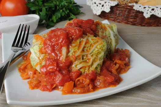 stuffed savoy cabbage under onion-carrot gravy