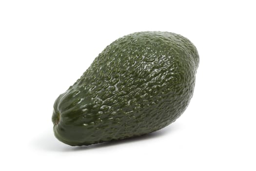 juicy whole avocado on a white background