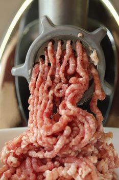 Meat grinder close up, preparation of forcemeat 