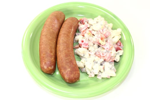 ham crackers with pasta salad against white background