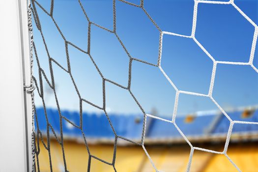 white soccer net of gate at stadium