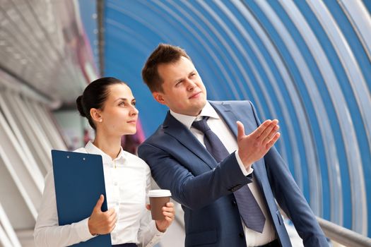 Successful business couple in the lobby of an office center