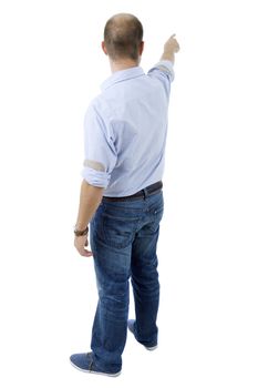 young casual man from the back pointing, full body, isolated