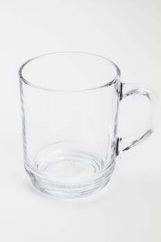 empty glass coffee cup against a white background