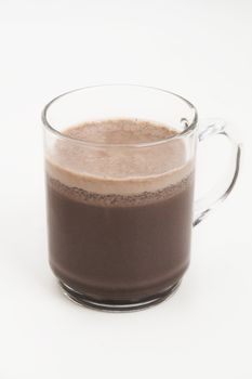 cup filled with frothy cocoa 