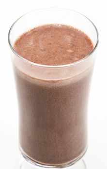 Chocolate milkshake against a white background