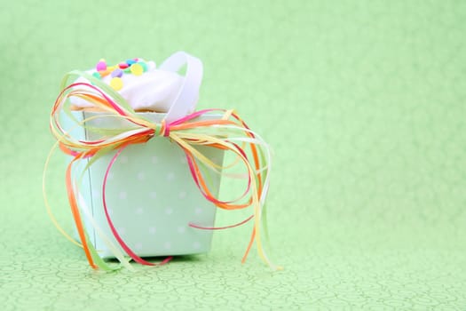 Tea party cupcake in a box with ribbons