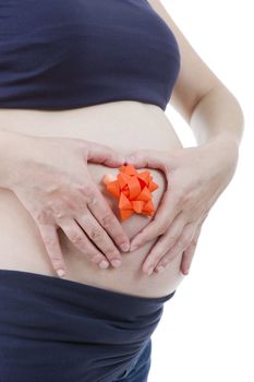 Closeup of pregnant woman at white background