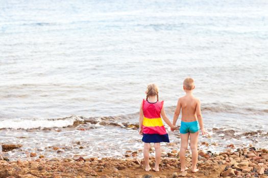 boy and girl on the beach