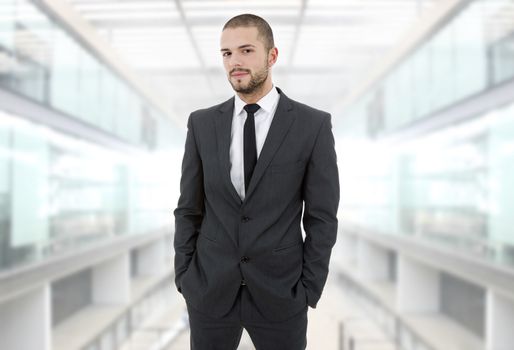 happy young business man at the office