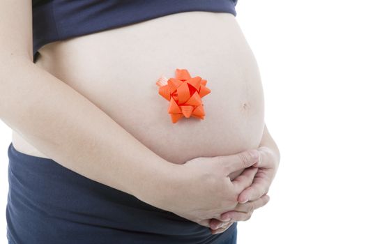 Closeup of pregnant woman at white background