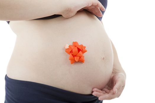 Closeup of pregnant woman at white background