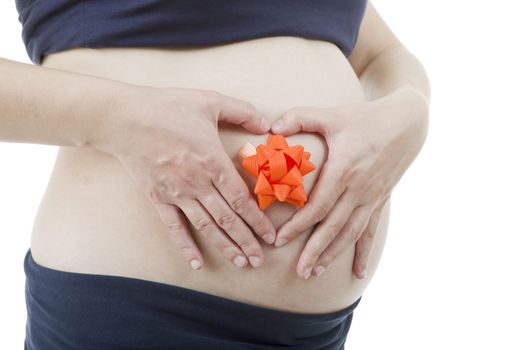 Closeup of pregnant woman at white background