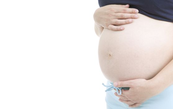 Closeup of pregnant woman at white background