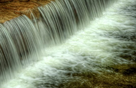 Some fast flow weir on the river, horizontal