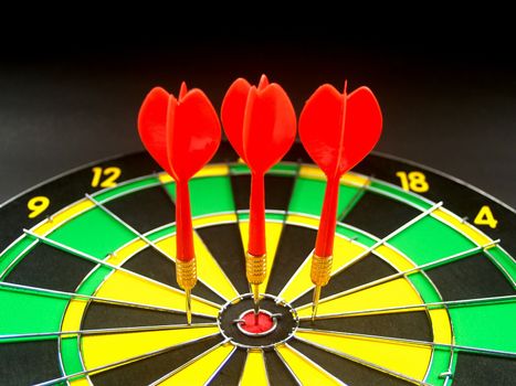 dartboard darts arrows in the target 