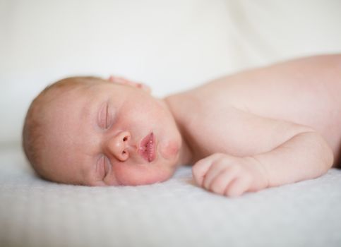 11 days young baby. Sleeping baby boy.