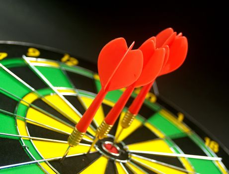 dartboard darts arrows in the target 