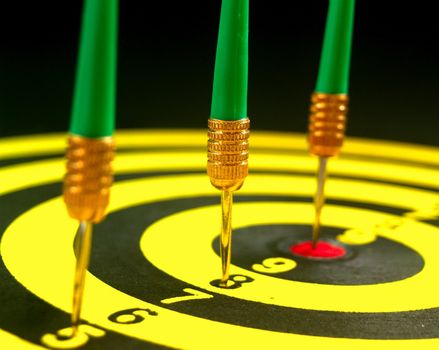dartboard darts arrows in the target 
